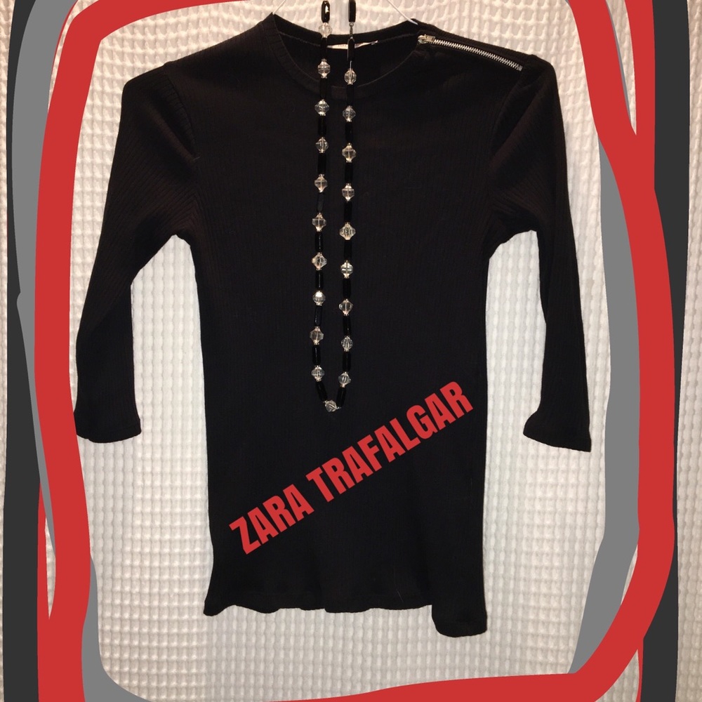 Flattering ribbed sweater top with zipper detail